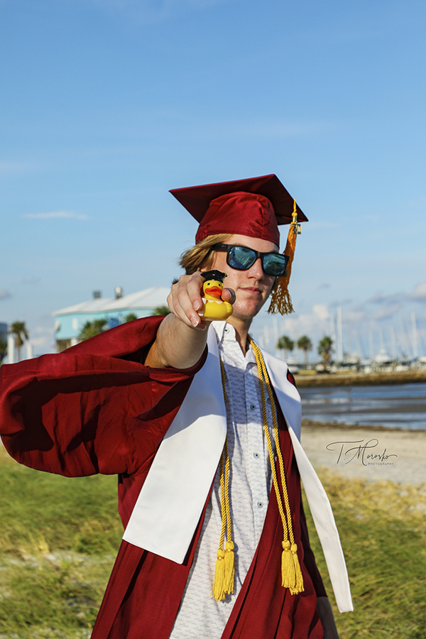 boy graduation with rubber duck