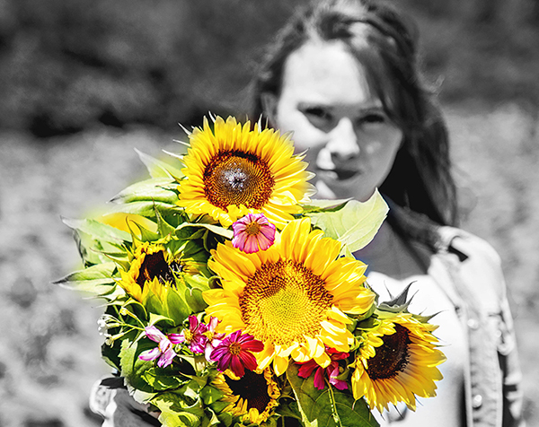 girl with sunflower boquet